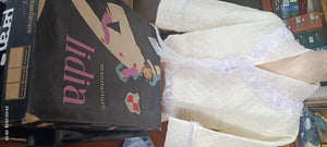 Articolo vintage. Giacca da casa impunturata Vanital, con merletti. 600g.